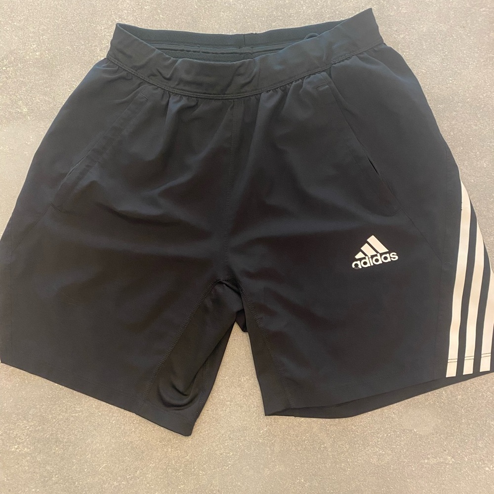 Adidas Black Athletic Shorts with Three-Stripe Design